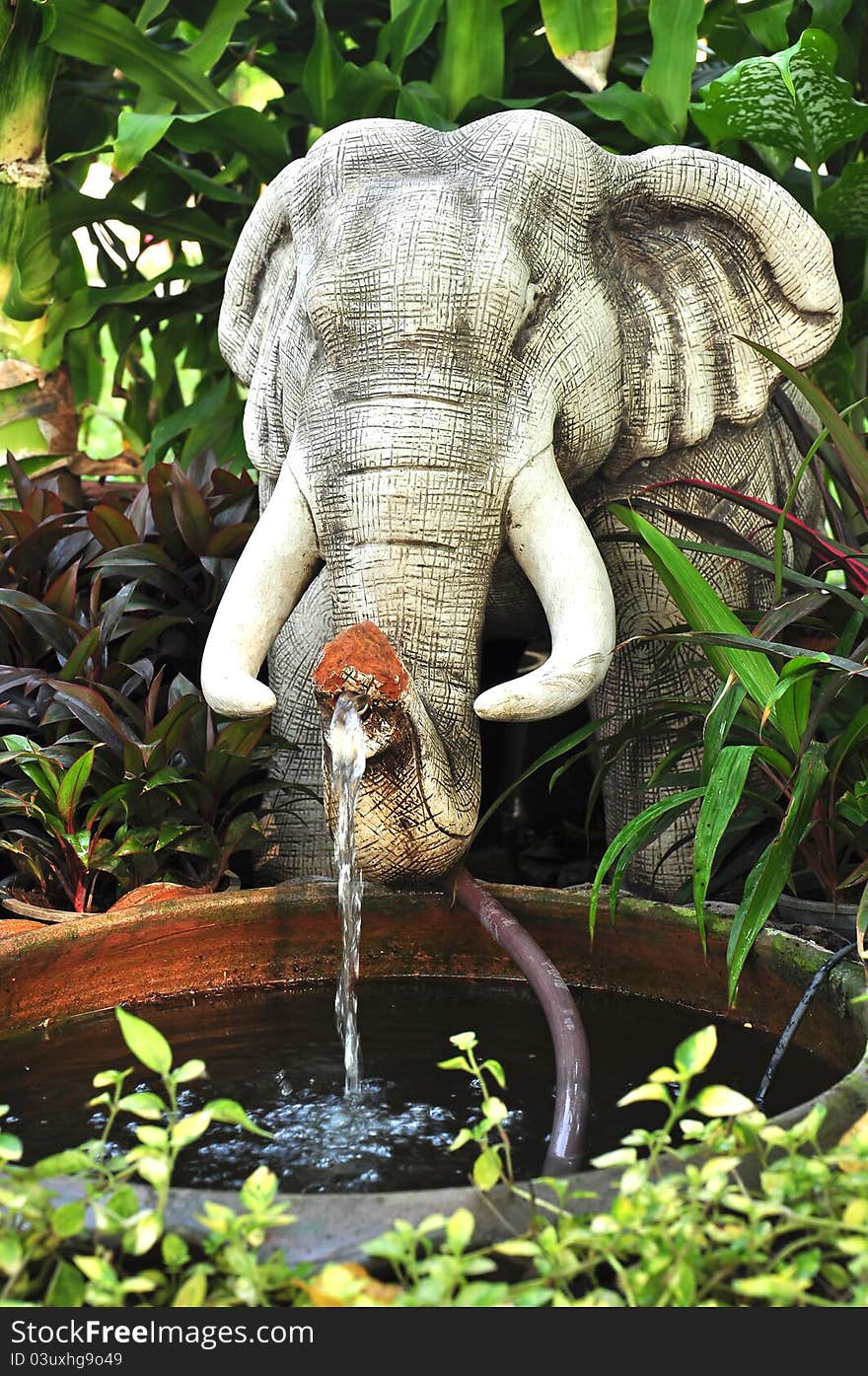 Elephant baked-clay, fountain, gardening