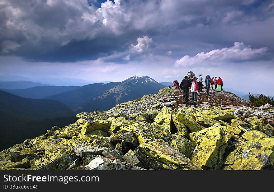 Tourist peak of the mountain sky the mountain air