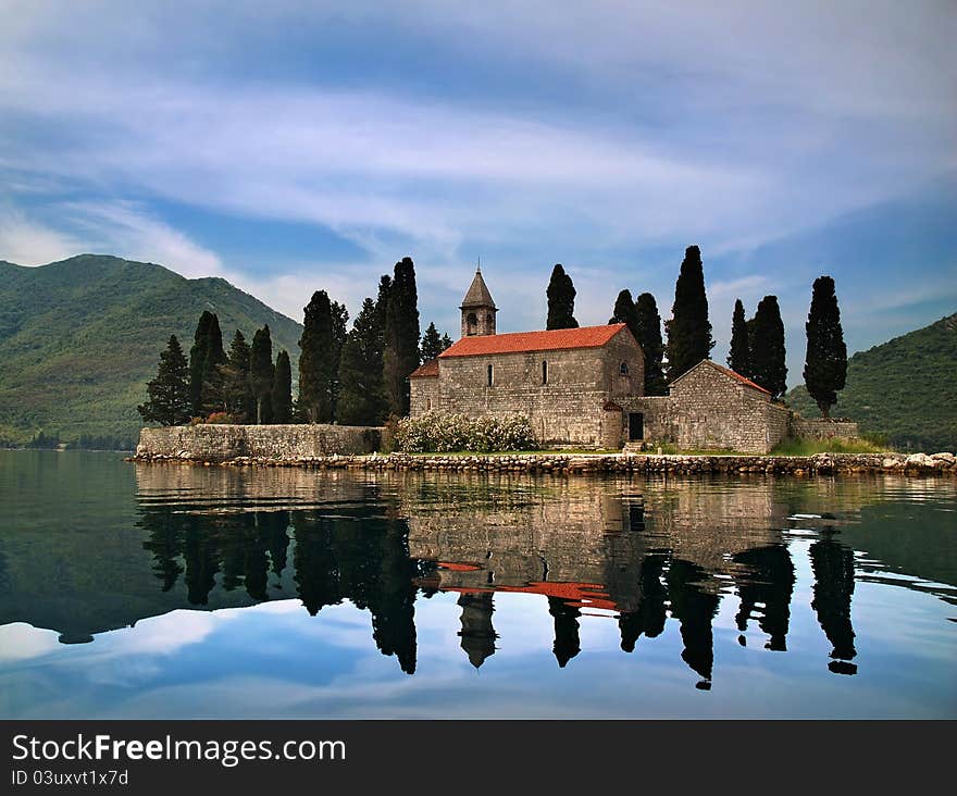 An ancient castle on a mountain lake. An ancient castle on a mountain lake