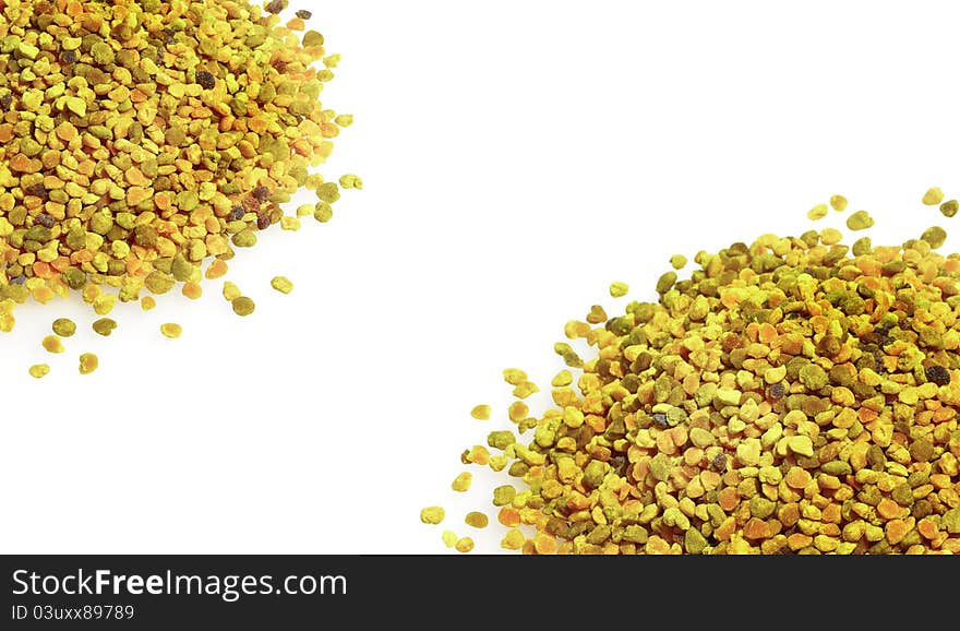 Bee pollen grains isolated on white background. Pollen granules close up.