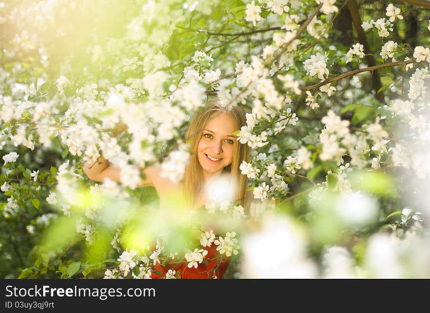 Beautiful blond girl with apple-tree. Beautiful blond girl with apple-tree