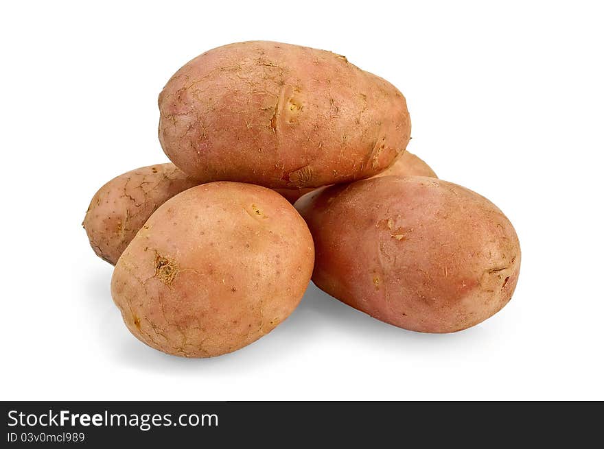 A small pile of potatoes pink with a light shade on white background. A small pile of potatoes pink with a light shade on white background