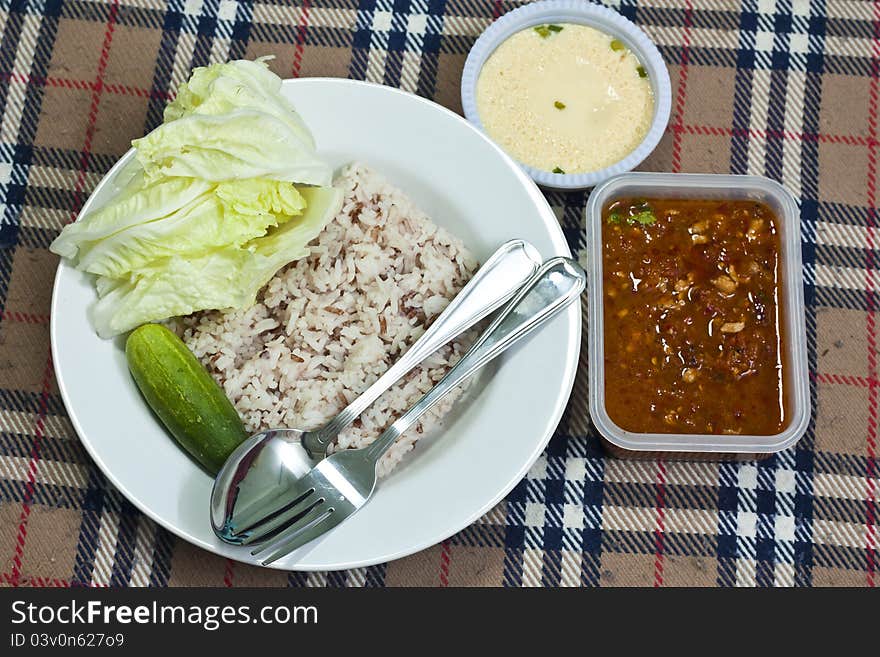 Chili sauce and vegetable with brown rice and steam egg. Chili sauce and vegetable with brown rice and steam egg