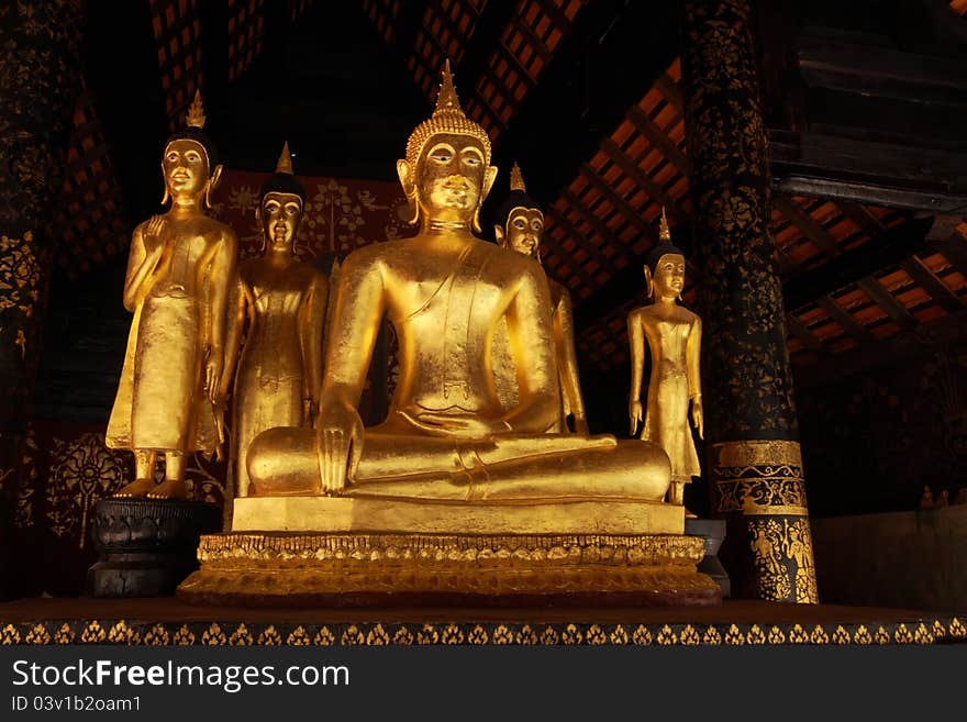 Golden Buddha statue in temple at Lampang province, Thailand