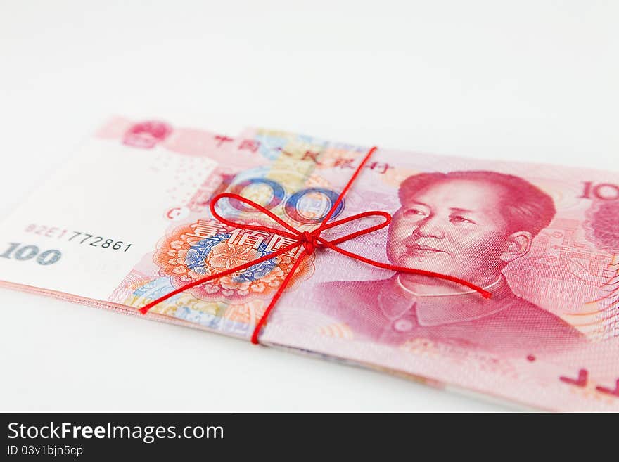 Chinese banknotes with a red string. Chinese banknotes with a red string