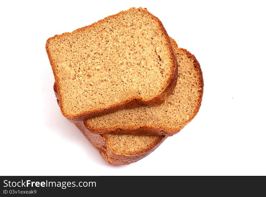 Cut bread on a white background