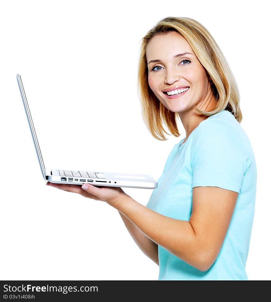 Happy young woman with laptop