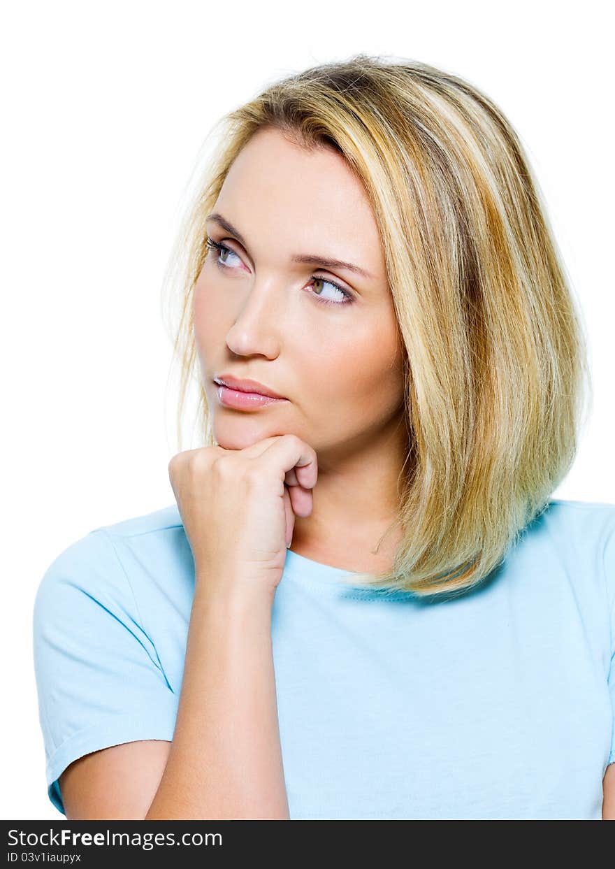 Portrait of an young thinking woman