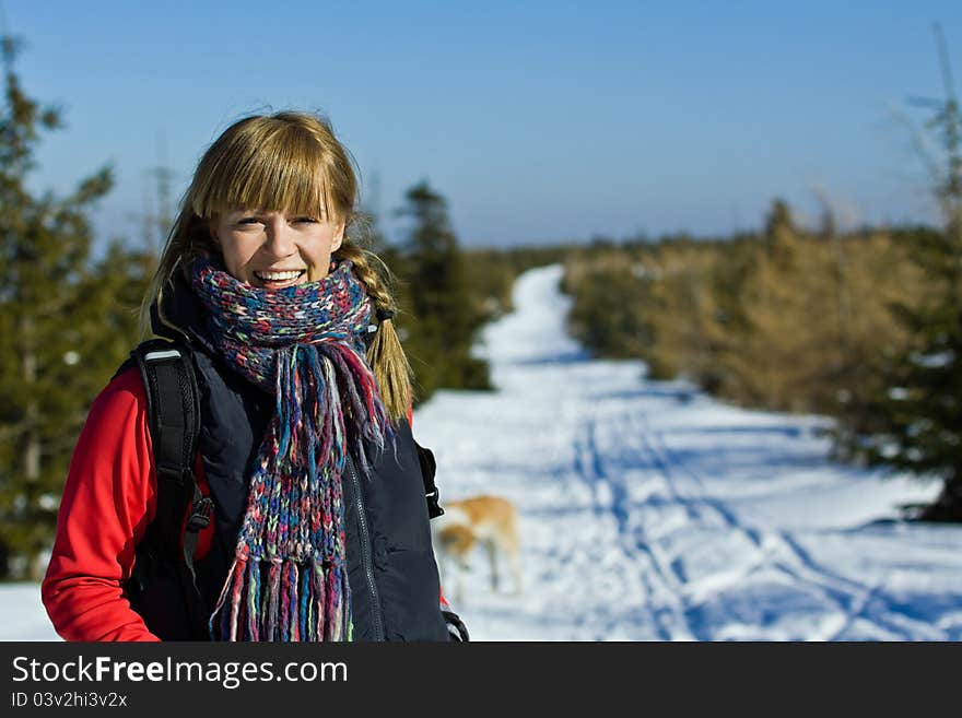 Woman hiker in winter mountains