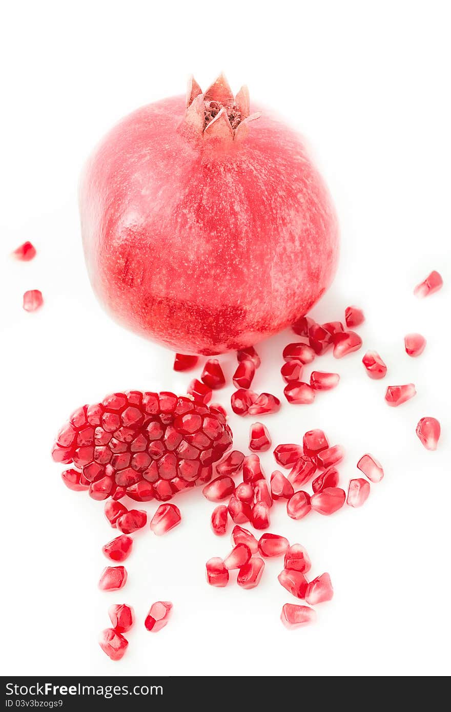 Fresh pomegranate on white background