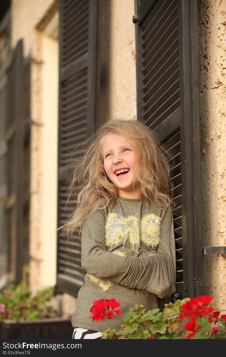 Girl posing by the window