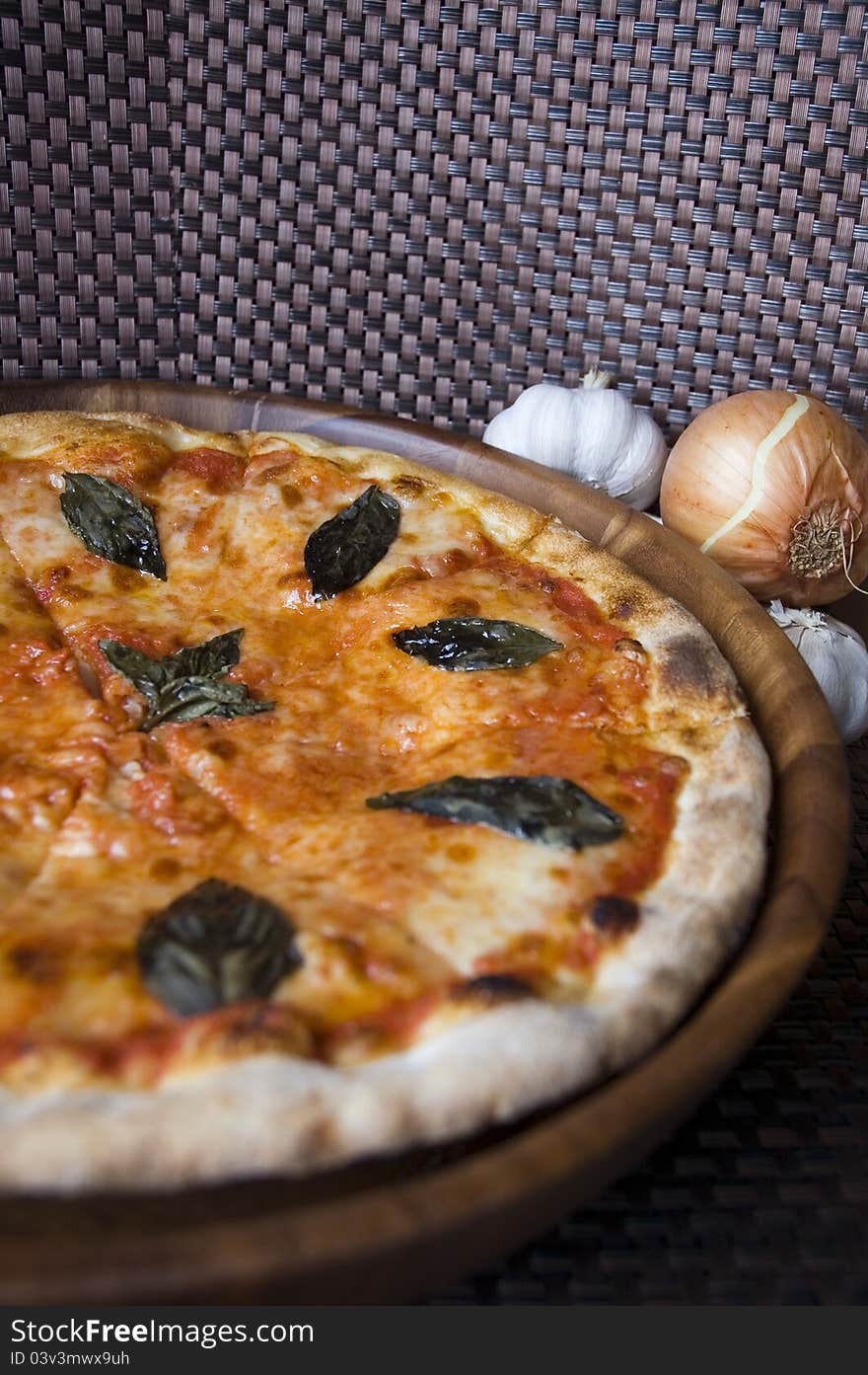 Tasty pizza on wooden tray and nature ingredient. Tasty pizza on wooden tray and nature ingredient