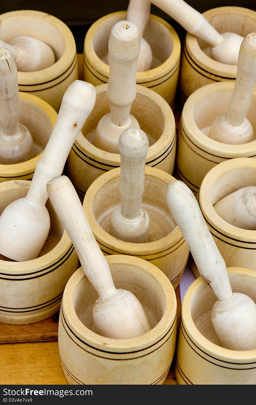 Detail of a group of wood pestles. Detail of a group of wood pestles