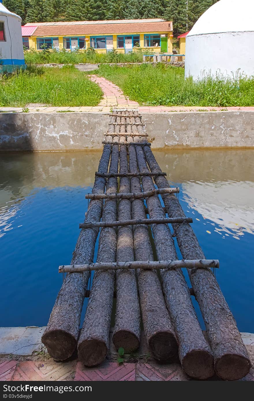 Wooden Bridge Leading To Home