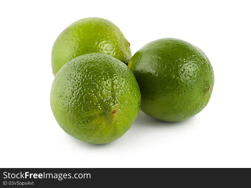 Three lime isolated on a white background