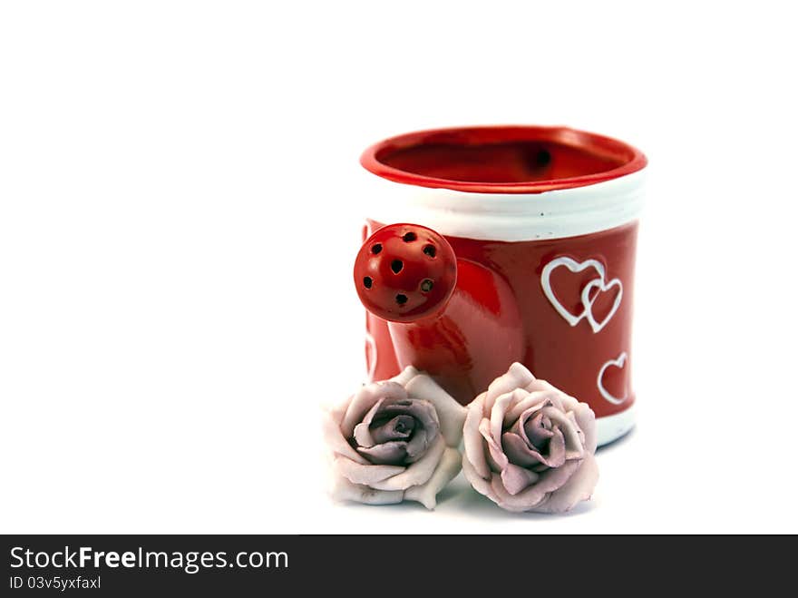 Red Watering Can With Two Roses