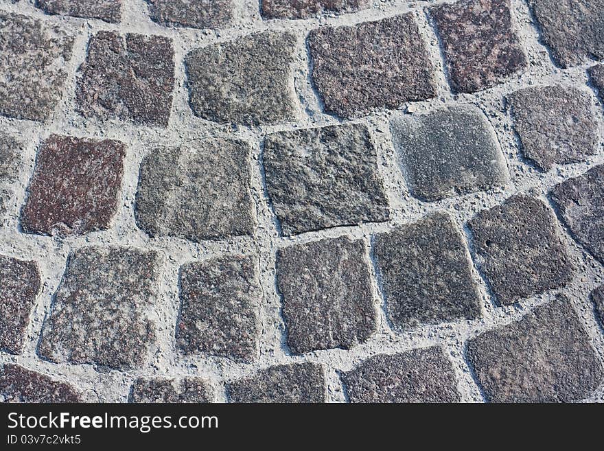 Surface of stone paved street. Surface of stone paved street