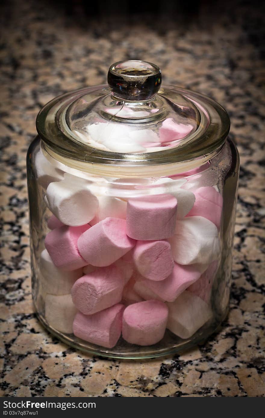 Marshmallows Jar on a stone countertop