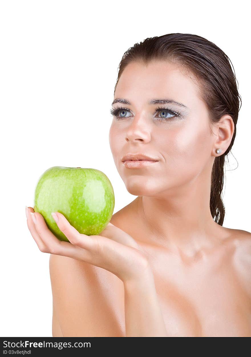 Beautiful girl holds in a hand green apple, isolated on white background