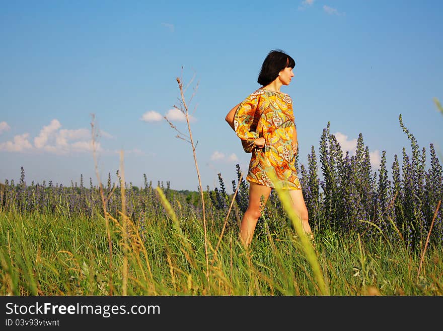 Woman alone on the flower field. Woman alone on the flower field