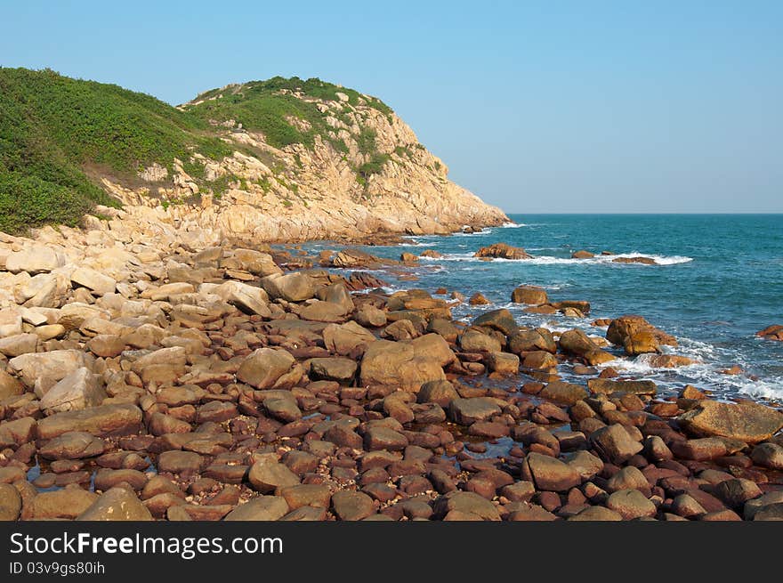 Sea side with stone and a clear sky. Sea side with stone and a clear sky