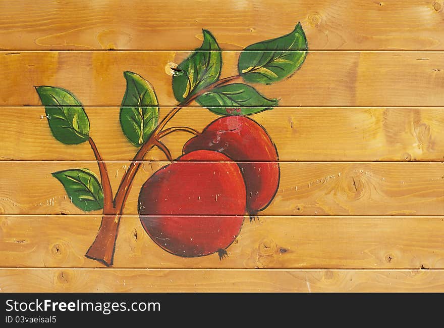 Apples branch painted on a wooden background, raw. Apples branch painted on a wooden background, raw