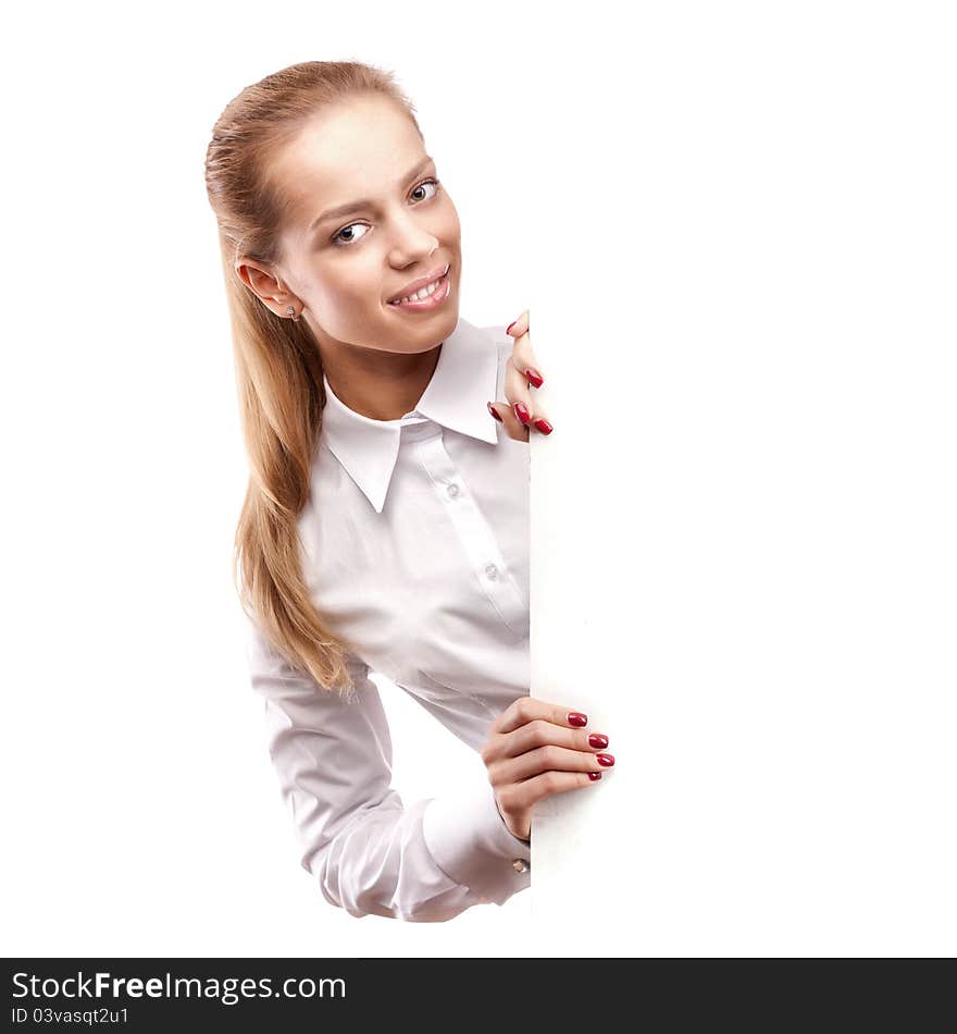 Happy smiling young business woman showing blank signboard, isolated on white background