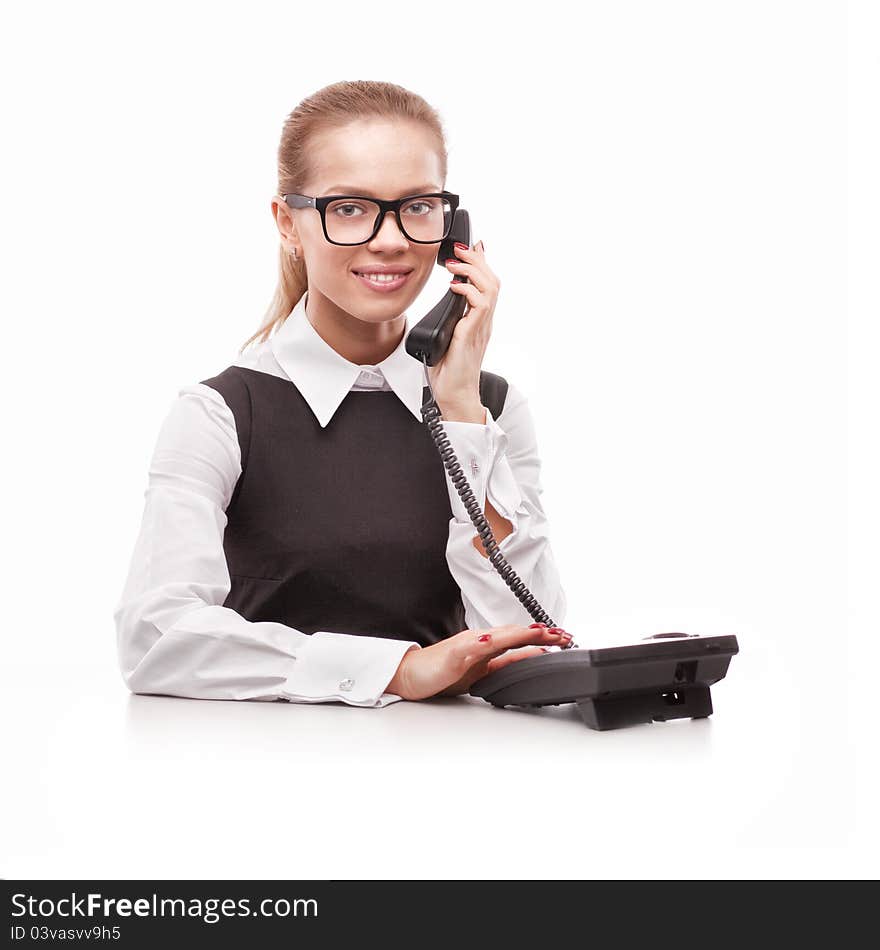 A beautiful business woman with phone on white background