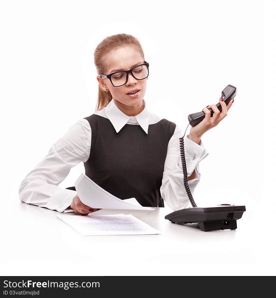 A beautiful business woman with phone on white background