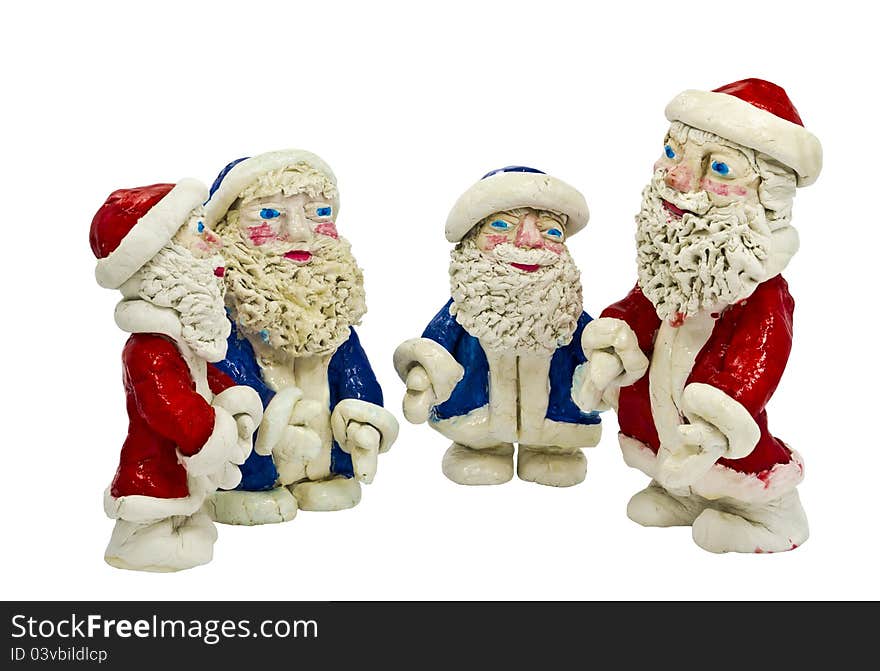 Figures of Santa Claus isolated on white