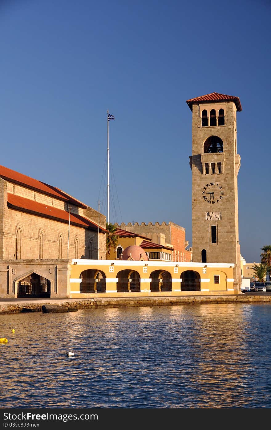 Clock tower rhodes harbour