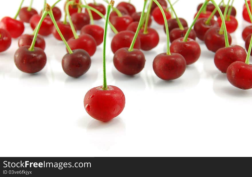 Cherries on white background