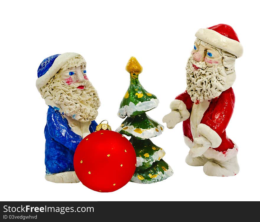 Clay figures of Santa Claus isolated on white