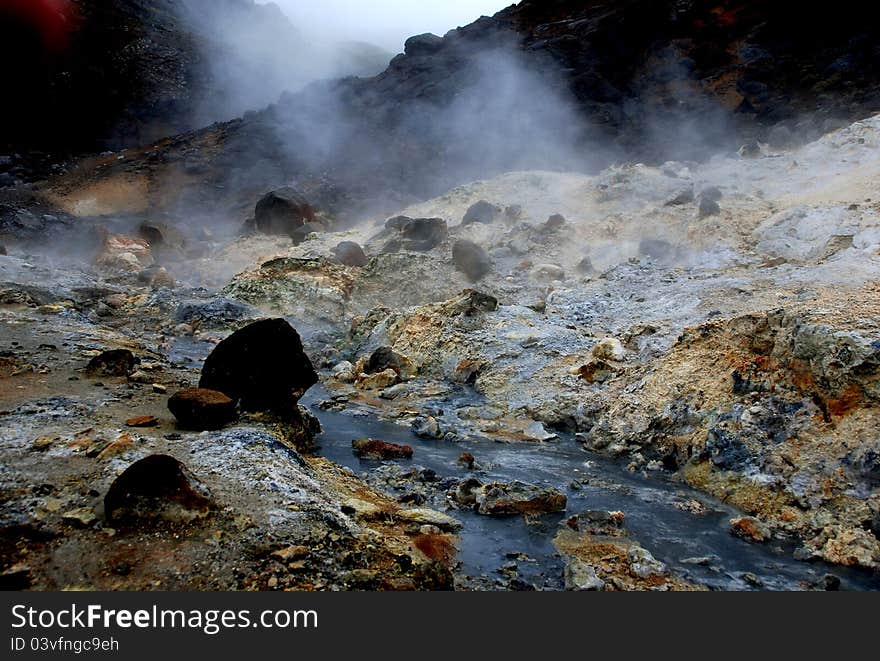 Smoke is rising from Iceland geyser