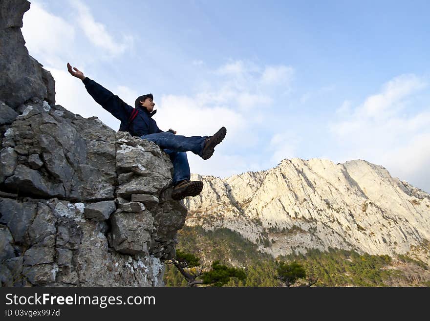 Man on top of the mountain