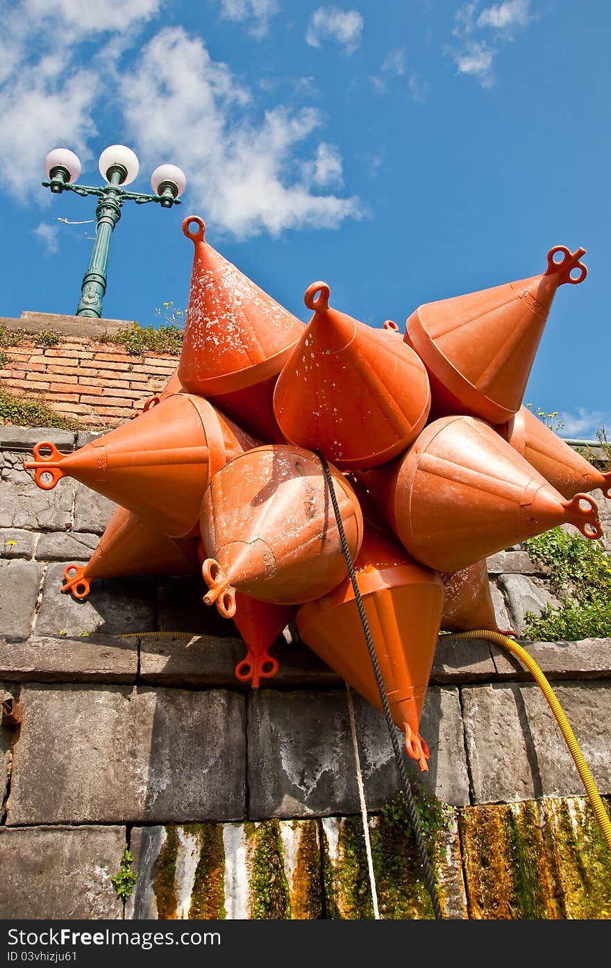 A group of mooring buoy next to the harbour in Napoli, Italy