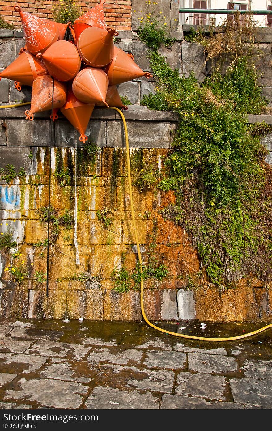 A group of mooring buoy next to the harbour in Napoli, Italy