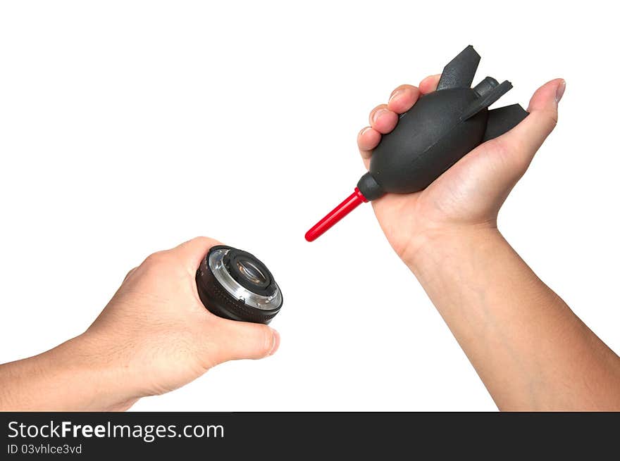 Using air pump to clean lens of a digital camera. Using air pump to clean lens of a digital camera