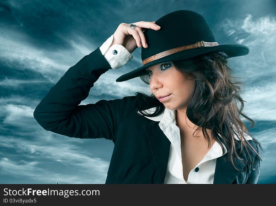 Beautiful woman in cowboy hat.