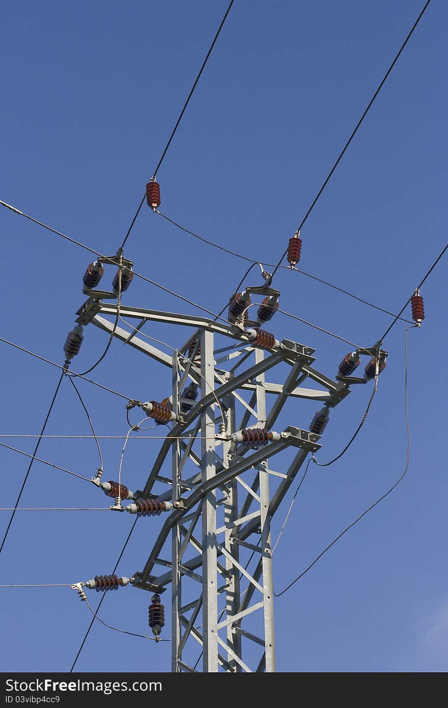 Power lines on the blue sky