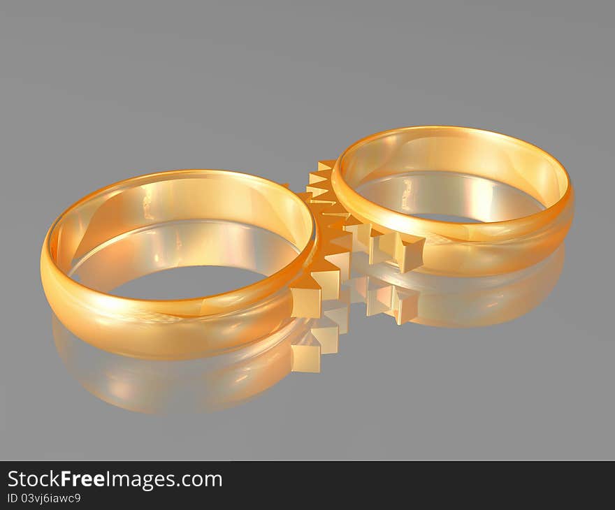 Two wedding gold rings with elements of gear wheels - a symbol of matrimonial relations. Two wedding gold rings with elements of gear wheels - a symbol of matrimonial relations.