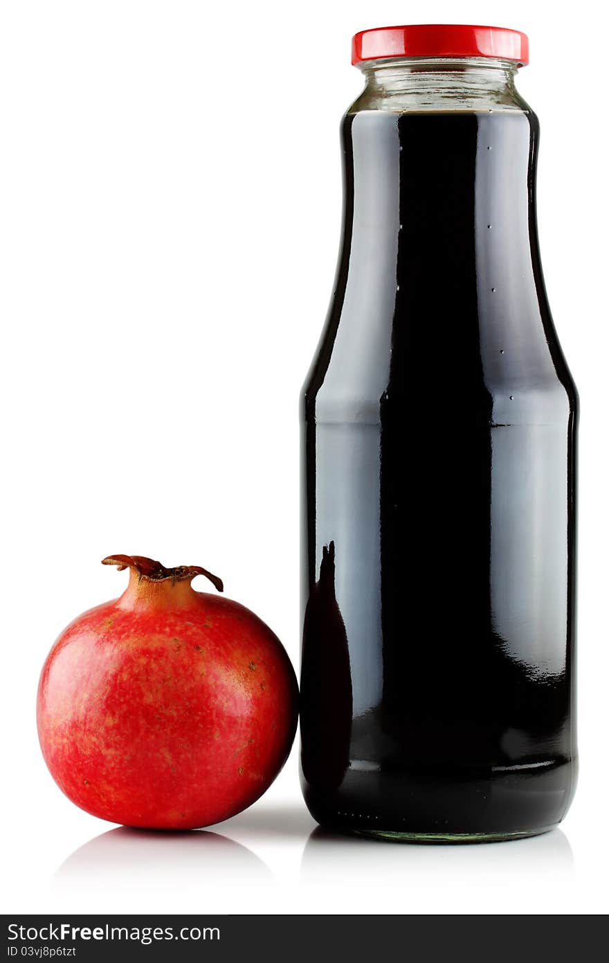 Juice and pomegranate on white background. Juice and pomegranate on white background.