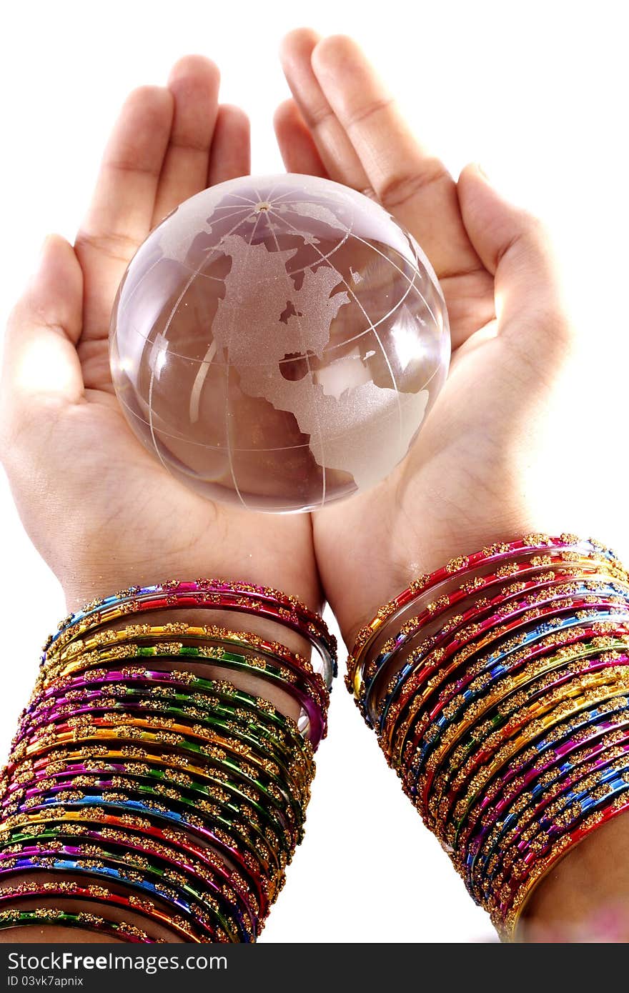 Glass globe in the hands of a woman. Glass globe in the hands of a woman