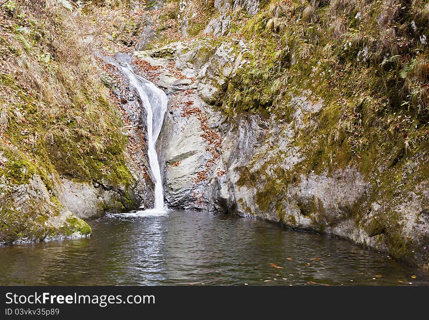 Autumn Waterfall in mountain