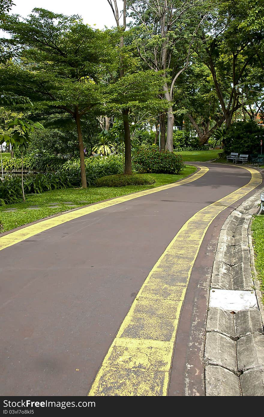 Walkway in the peaceful park. Walkway in the peaceful park