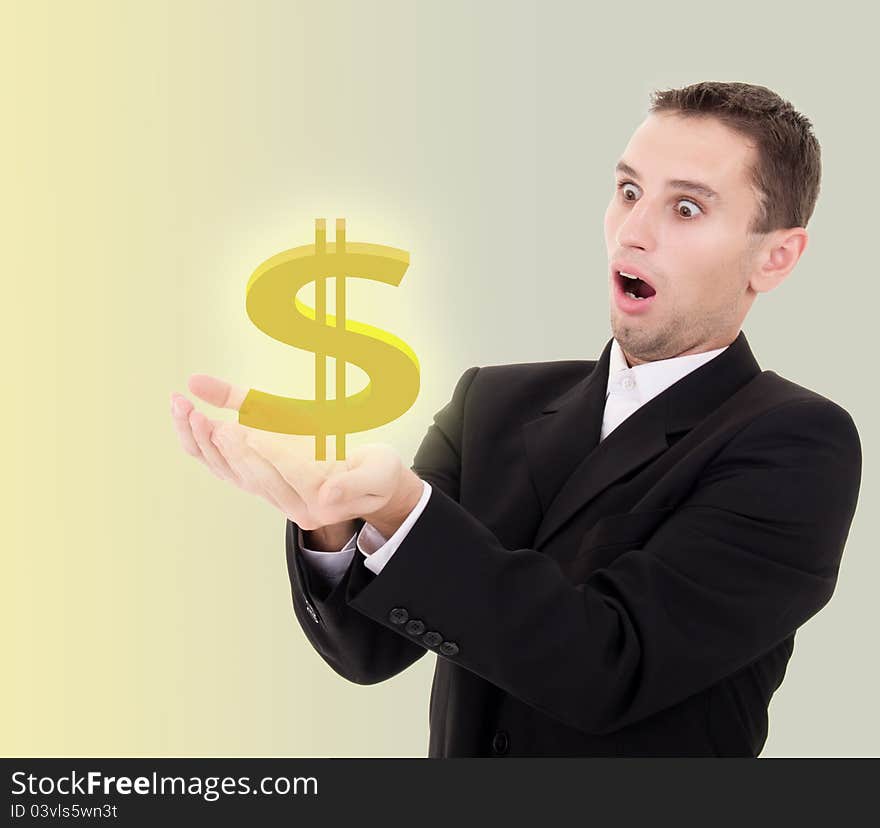 Young businessman chooses golden US dollar sign