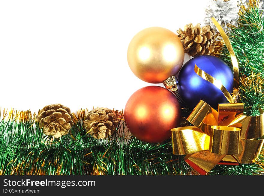 Christmas decor with golden fir cone and colorful balls. Christmas decor with golden fir cone and colorful balls