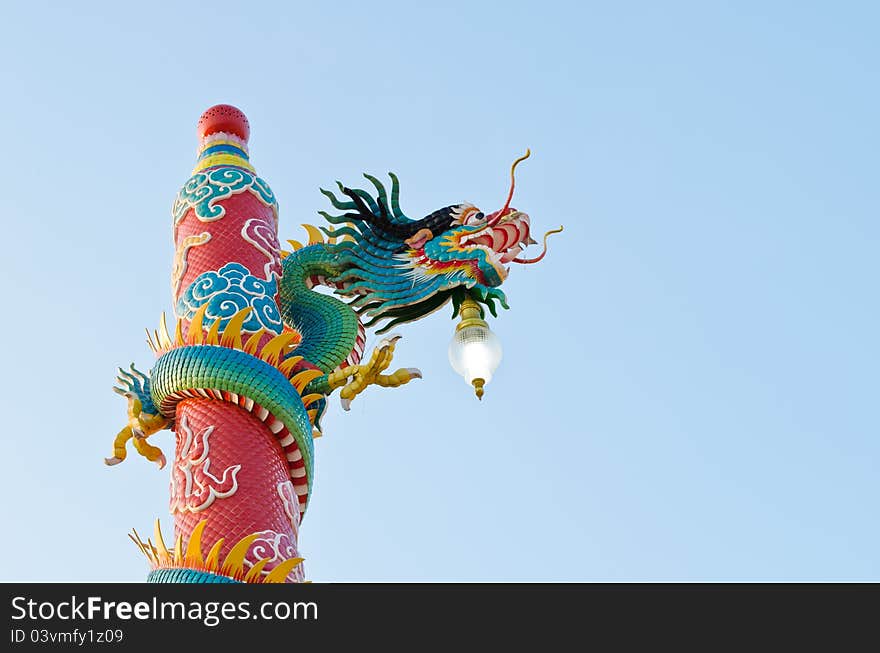 Colorful dragon statue at Chinese shrine ,Thailand and blue sky background