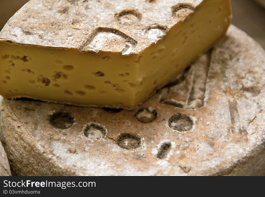 Italian cheese at market can be used as a background