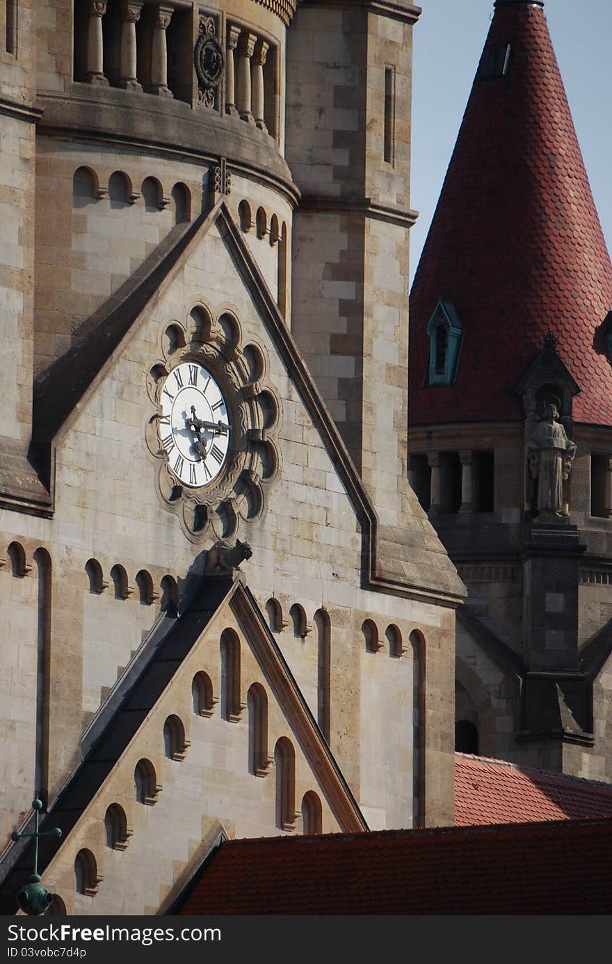 Steeple clock up high towers with many